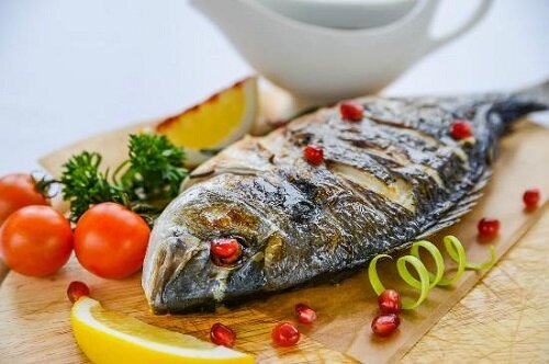 Карп с овощами